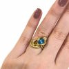 Blue Topaz and Diamond Knot Motif Ring