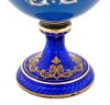 Hand Painted Porcelain Egg On An Enamelled Silver Stand, circa 1900