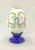 Hand Painted Porcelain Egg On An Enamelled Silver Stand, French, circa 1900