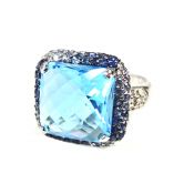 Modern Blue Topaz Blue Sapphire and Diamond Ring