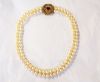 Modern Pearl Necklace with Ruby Diamond Clasp