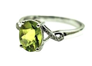 Modern Peridot and Diamond Ring