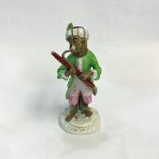 Nineteenth-Century Meissen Style German Porcelain Monkey Band Figure Playing an Early Bassoon
