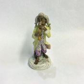 Nineteenth-Century Meissen Style German Porcelain Monkey Band Figure Playing an Early Oboe