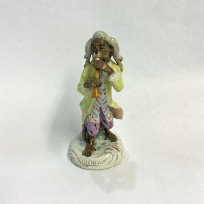 Nineteenth-Century Meissen Style German Porcelain Monkey Band Figure Playing an Early Oboe