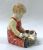 Paragon Figurine Pals,  a Young Boy and a Basketful of Puppies