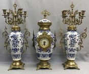 Three Piece Garniture of a Mantle Clock & Candelabra
