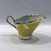 Vintage Hutschenreuther Silver Overlay on a Yellow Porcelain Three Piece Coffee Set