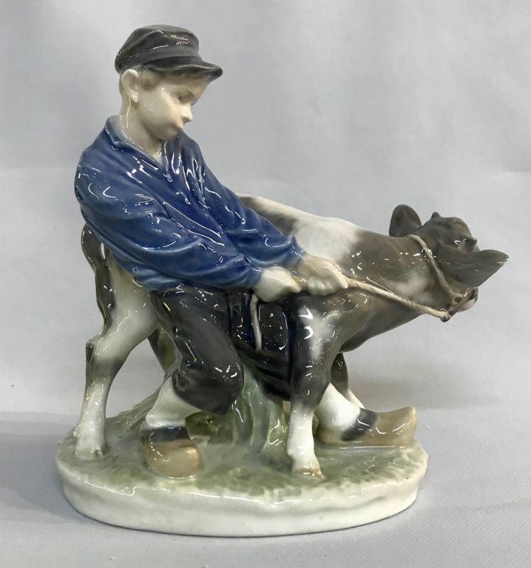 Vintage Royal Copenhagen figurine “Boy With Calf”