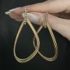 Modern .37ct Diamond 18kt Triple Hoop Earrings