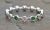 Modern Emerald and Diamond Ring