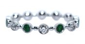 Modern Emerald and Diamond Ring