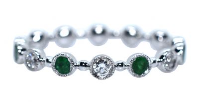 Modern Emerald and Diamond Ring