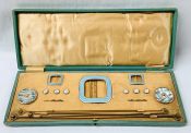Mother of Pearl & Enamelled Hat Pins & Buckles In A Fitted Box