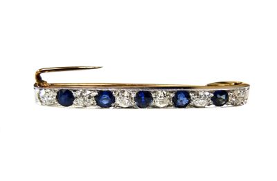 Edwardian 1.24ct Sapphire and 1.03ct Diamond 'Safety Pin' 14kt Brooch