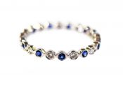 Modern Diamond and Sapphire Eternity Band
