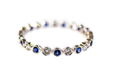 Modern Diamond and Sapphire Eternity Band