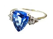 Modern Tanzanite and Diamond Ring