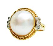 Modern Pearl and Diamond Ring