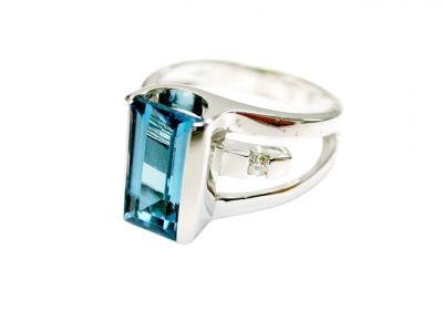 Modern Blue Topaz and Diamond Ring