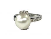 Modern Pearl and Diamond Ring