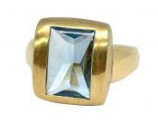 Modern Blue Topaz Solitaire Ring