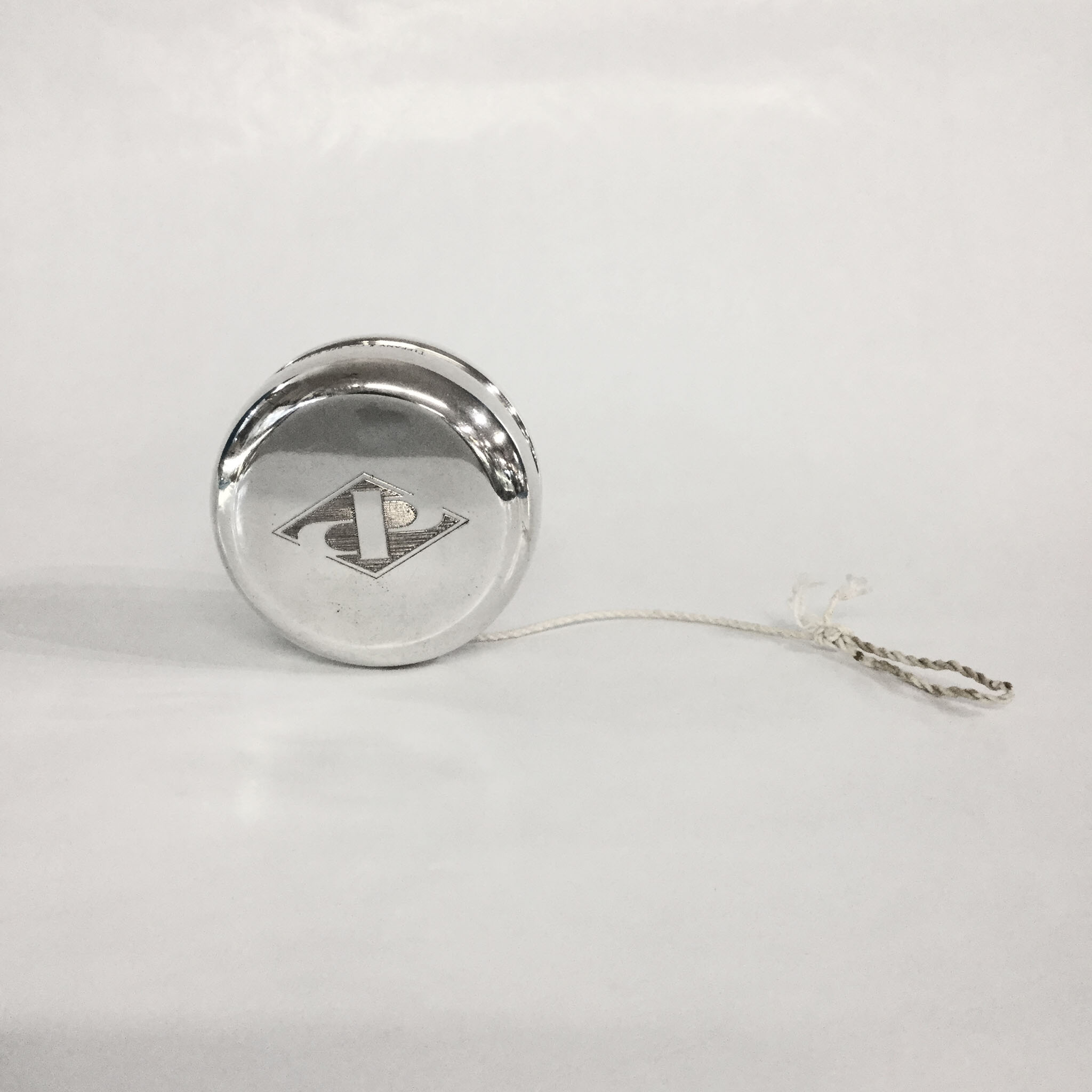 Tiffany & Co. Sterling Silver and Wood Yo-Yo | Cynthia Findlay