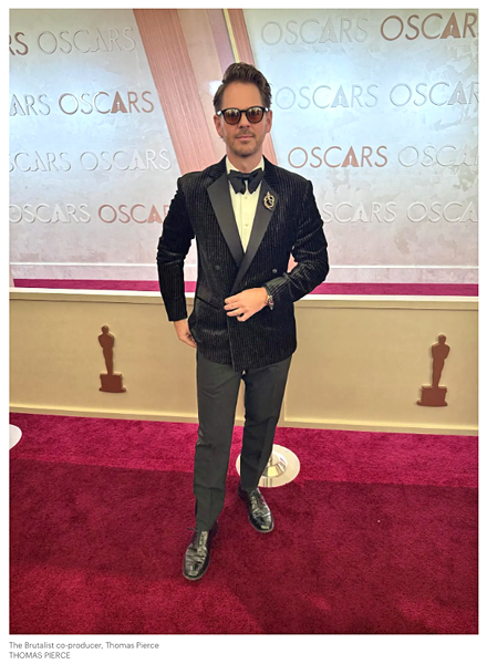 The Brutalist co-producer Thomas Pierce wearing a men's brooch at the 97th 2025 Oscars