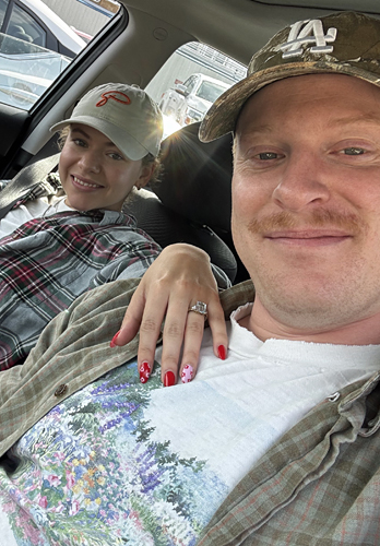 Elliot & Auytmn' cute vintage engagement ring picture in the car, congratulations!