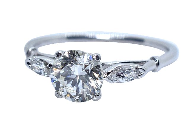 1.22ct round brilliant cut vintage diamond engagement ring set in platinum.